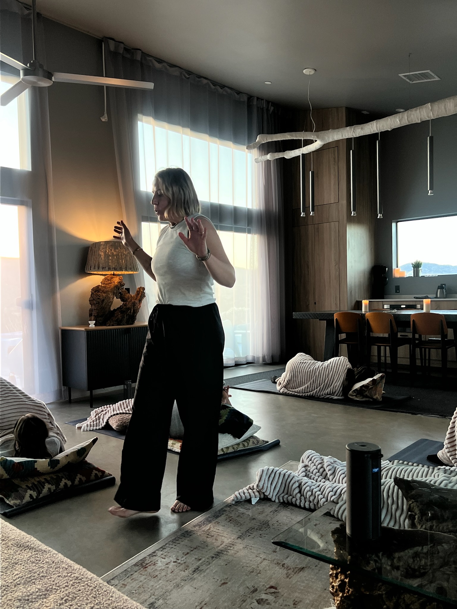 Woman preparing a retreat space indoors
